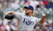  ?? JOHN BAZEMORE — THE ASSOCIATED PRESS ?? Tampa Bay Rays starting pitcher Rich Hill delivers against an Atlanta Braves batter in the first inning of a baseball game Sunday, July 18, 2021, in Atlanta.
