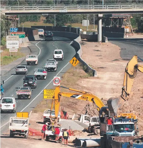  ??  ?? Work under way on the Pacific Highway near Coomera in 1998.