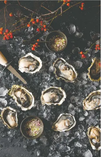  ?? PHOTOS: REBECCA WELLMAN ?? Raw oysters are a must for French New Year's celebratio­ns, say cookbook authors Laura Bradbury and Rebecca Wellman. And an apple mignonette takes the flavour experience to a new level.