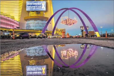 New Las Vegas Sign I Downtown Las Vegas arches light up for the first time  