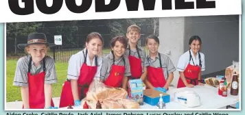  ?? ?? Aiden Croke, Caitlin Royle, Jack Ariel, James Dobson, Lucas Owsley and Caitlin Wong prepare to serve sausages to Newman Catholic College students.