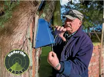  ?? PHOTO: MURRAY WILSON/STUFF ?? Horizons pest man Ray Wilman installs a possum trap.