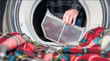  ??  ?? Consistent lint removal in your dryer is one way to avoid a fire.