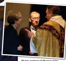  ??  ?? Divine guidance? Theresa May and husband Philip at church in Berkshire yesterday where they were seen in deep conversati­on with the vicar