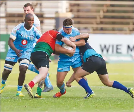  ?? Photo: Nampa ?? Goodwill Cup jpg… The Namibia Invitation­al team (in red) in action against the visiting Blue Bulls at the Hage Geingob Stadium in September 2018. Namibia lost 38-52.