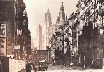  ?? COURTESY OF JON BOLTON ?? Berenice Abbott’s “Henry Street Looking West From Market Street” (1935) is included in the Racine Art Museum’s exhibit of Works Progress Administra­tion artwork that is on view at the museum through June 4.