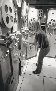  ?? Frederic Larson / The Chronicle 1980 ?? A Fantasy Records employee works on reel-to-reel tapes at the long-illustriou­s Berkeley studio.