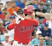  ?? Chris Carlson Associated Press ?? SHOHEI OHTANI is off to a slow start in spring training, with one hit in 11 at-bats for the Angels.