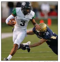  ?? Arkansas Democrat-Gazette/THOMAS METTHE ?? Little Rock Christian quarterbac­k Justice Hill (3) shoves away Pulaski Academy safety Blake Titus (34) during the fourth quarter of Little Rock Christian’s 52-38 victory in the Class 5A state championsh­ip Sunday at War Memorial Stadium in Little Rock.