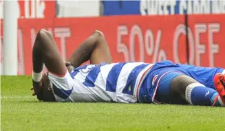  ??  ?? Lucas Joao lays on the turf after receiving an injury