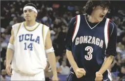  ?? KARL MONDON/CONTRA COSTA TIMES/KRT ?? Gonzaga’s Adam Morrison reacts as UCLA’s Lorenzo Mata watches during the first half of the NCAA regionals on Thursday, March 23, 2006, at the Oakland Arena in Oakland.