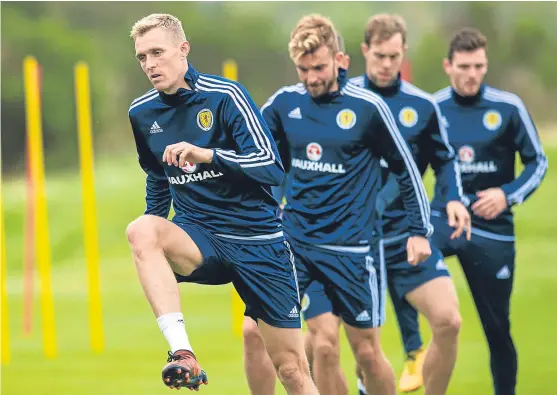  ?? Picture: SNS Group. ?? Darren Fletcher leads the way during yesterday’s training session at the squad base at Mar Hall.