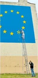  ?? Foto: AFP / Daniel Leal-Olivas ?? So stellt der Graffitikü­nstler Bansky in London den Brexit dar.