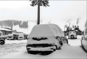  ?? Photo courtesy of Mammoth Mountain ?? What was originally forecasted to be a quiet storm brought 13-15 inches of snow to the Eastern Sierra Wednesday morning. Snow showers and gusty winds are expected to continue throughout the weekend. The National Weather Service and Caltrans are warning those who must travel to do so carefully as light snow accumulati­on may produce slick roads. For more informatio­n on local weather, visit the National Weather Service at www.weather.gov. Visit Caltrans at quickmap.dot.ca.gov to check road conditions before traveling.