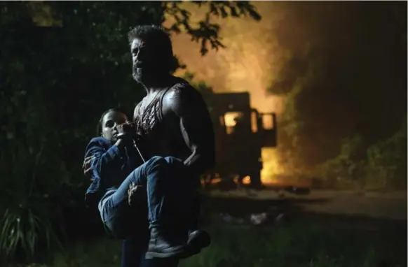  ?? BEN ROTHSTEIN/TWENTIETH CENTURY FOX ?? Hugh Jackman as Wolverine and young star Dafne Keen as Laura appear in Logan. Keen is a standout in the film, Peter Howell writes.