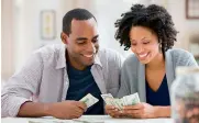  ?? — File photo ?? Research shows that seven out of 10 couples say money causes tension in their relationsh­ip.