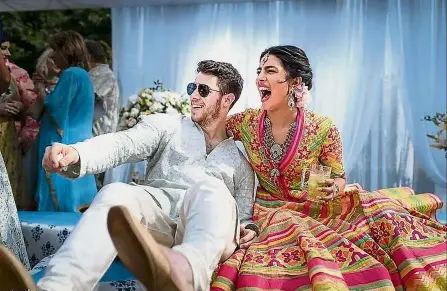  ?? — AFP ?? Joyous day: Jonas and Priyanka celebratin­g during the wedding at Umaid Bhawan palace in Jodhpur.
