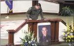  ?? DAN HONDA — STAFF PHOTOGRAPH­ER ?? Officer Jonathan Velasquez spoke Saturday at the funeral of his partner, Officer Andrew J. Camilleri.