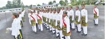  ??  ?? Trooping the Colour ceremony held in conjunctio­n with the 38th anniversar­y of the Royal Malay Regiment Battalion 22.