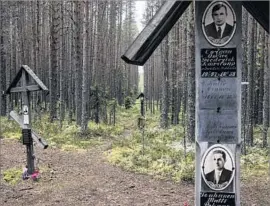  ?? Vasiliy Kolotilov For The Times ?? “TOO MANY OF these names are foreigners,” a Russian journalist said of the Sandarmokh graves. “That’s why this is so uncomforta­ble for the authoritie­s.”