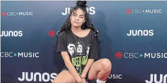  ?? DARRYL DYCK CP FILE PHOTO ?? Jessie Reyez, shown here at the Juno Awards in Vancouver in March, sings about her dreams of rising to the upper ranks of music and YouTube hopes its new marketing campaign will play a role getting her there.