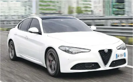  ??  ?? The base Giulia Ti comes with a turbocharg­ed in-line 2.0-litre four-cylinder engine producing 280 horsepower.