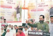  ?? PHOTO: PTI ?? Mukhtar Abbas Naqvi, minister of state for parliament­ary affair, addresses the 'Progress Panchayat' programme at Bichhor village in Mewat district of Haryana on Thursday.