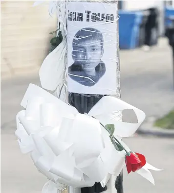  ?? AFP ?? A small memorial where 13-year-old Adam Toledo was shot by a Chicago Police officer in Illinois, US, on Thursday.