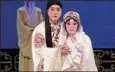  ?? KANG ZHENG / FOR CHINA DAILY ?? Peking Opera performers interpreti­ng the romantic story of Legendofth­eWhite Snake.