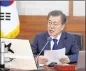  ?? KIM JUHYOUNG / YONHAP ?? South Korean President Moon Jae-in wants to use the Pyeongchan­g Olympics as a chance to improve inter-Korean ties.