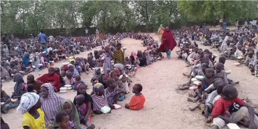  ??  ?? Feeding time at an IDPs Camp