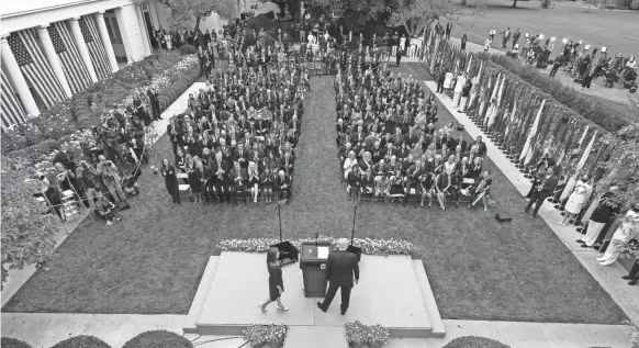  ?? ALEX BRANDON/AP ?? President Donald Trump announces Judge Amy Coney Barrett as his nominee to the Supreme Court in the Rose Garden on Sept. 26.