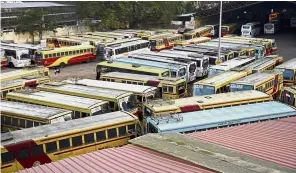  ??  ?? Going nowhere: The main bus terminus after schedules were cancelled during the strike in Thiruvanan­thapuram to protest the entry of women at the Sabarimala temple. — AP