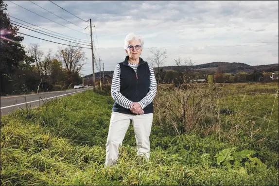  ?? BRYAN ANSELM / THE NEW YORK TIMES ?? Jeanne Mettler is the town supervisor of Copake, N.Y., which unsuccessf­ully challenged a new law aimed at making solar projects easier to build. Developers planning industrial-scale solar farms to meet the nation’s climate goals are often met with resistance from locals who see them as encroachin­g on their pastoral settings and threatenin­g property values.