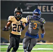  ?? Staff photo by Hunt Mercier ?? ■ Pleasant Grove wingback Antonio Watkins heads downfield as a Nevada Community Brave gives chase Friday at Hawk Stadium in Texarkana, Texas.