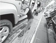  ?? FILE PHOTO BY MADALYN RUGGIERO, AP ?? Pam Bialecki works on a 2012 Jeep Wrangler at the Chrysler Toledo Assembly complex in Toledo, Ohio, in 2011.