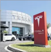  ?? Allen J. Schaben Los Angeles Times ?? TESLA declined to comment on the report of an SEC subpoena. Above, a service facility in Costa Mesa.