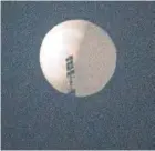  ?? — AFP ?? That’s no moon: A suspected Chinese spy balloon in the sky over Billings, Montana.