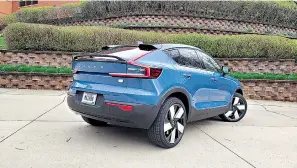  ?? Henry Payne/the Detroit NEWS/TNS ?? The fastback 2022 Volvo C40 Recharge has c-clamp rear taillights that are different from the boomerang lights on brother XC40 Recharge.