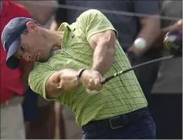  ?? ERIC GAY — THE ASSOCIATED PRESS ?? Rory McIlroy hits his tee shot on the 16th hole during the first round of the PGA Championsh­ip on Thursday in Tulsa, Okla.