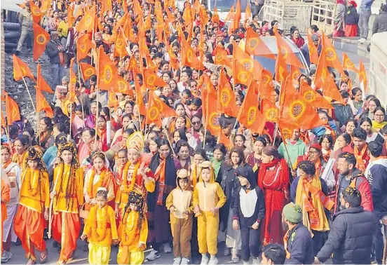  ?? Picture: THE HINDUSTAN TIMES ?? Devotees take part in a procession ahead of the ‘Pran Pratishtha’ ceremony of Ayodhya Ram Temple, in Kullu.