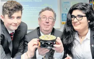  ??  ?? ●● Dr Richard Crowder is pictured with Ben Allmand-Smith and Sameera Lyons at King’s School