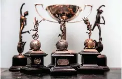  ??  ?? Ralph collected these trophies, including three from the Manx GP, two TT replicas and a 1937 BMCRC (Brooklands) cup presented by Sir Algernon Guinness Bart