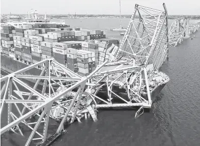  ?? REUTERS ?? A drone view of the cargo vessel that crashed into the bridge in Baltimore, March 26.