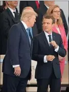  ??  ?? Donald Trump et Emmanuel Macron, lors des célébratio­ns du 14-Juillet.