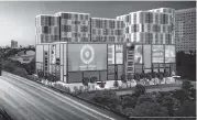  ?? Swerdlow Group ?? A rendering shows how a planned $350 million retail and apartment complex in Overtown would look from I-95.