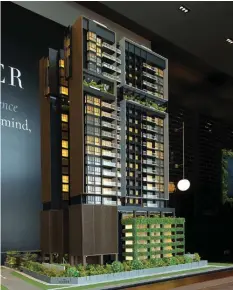  ?? SAMUEL ISAAC CHUA/THE EDGE SINGAPORE ?? A two-bedroom unit at The Atelier fetched the lowest record psf-price for a developmen­t during the week