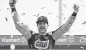  ?? Jared C. Tilton / Getty Images ?? Kurt Busch took the lead with 24 laps left and held on for his first win of the year and a playoff spot.