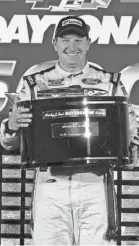  ?? CHRIS GRAYTHEN/GETTY IMAGES ?? Michael McDowell celebrates in victory lane at the Daytona 500 on Feb. 14.