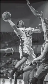  ??  ?? TOP CHAMPION: Champion Christian College’s Pargo Williams led all scorers with 30 points in a 113-106 double-overtime loss Tuesday to National Park College at Bank of the Ozarks Arena. Photo by Aaron Brewer, courtesy of National Park College.